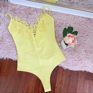 Yellow bodysuit
